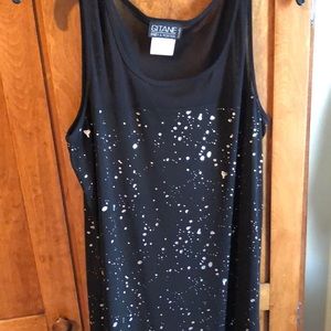 Sleeveless full length dress.